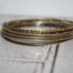 Beautiful gold bangle bracelet set of 10 7"